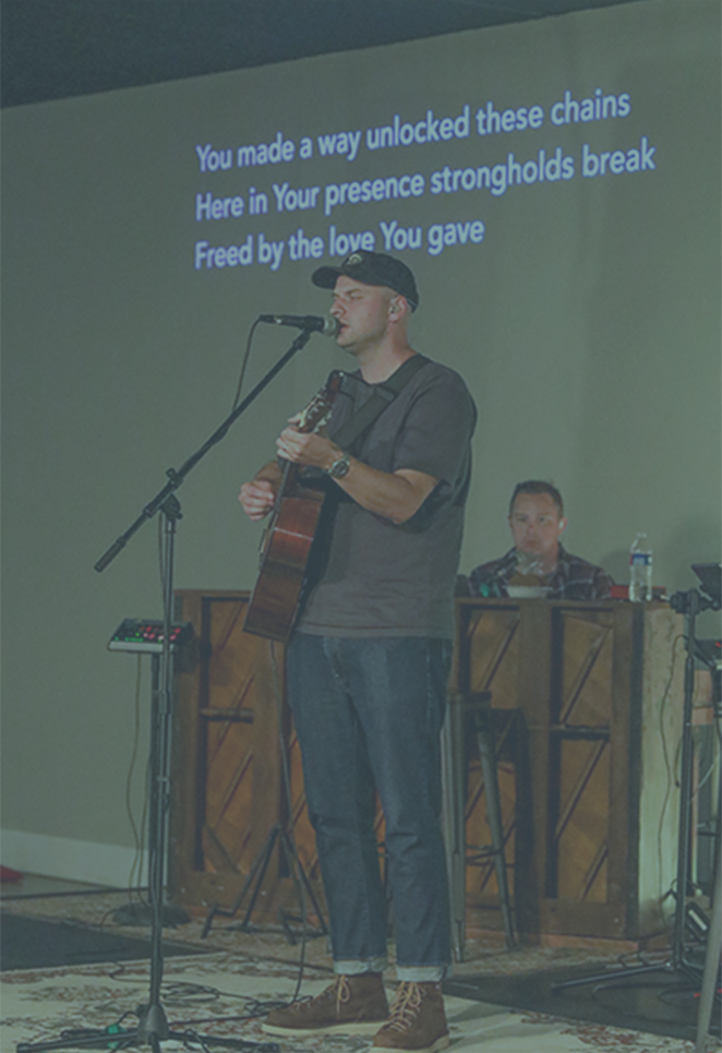 Worship leader singing